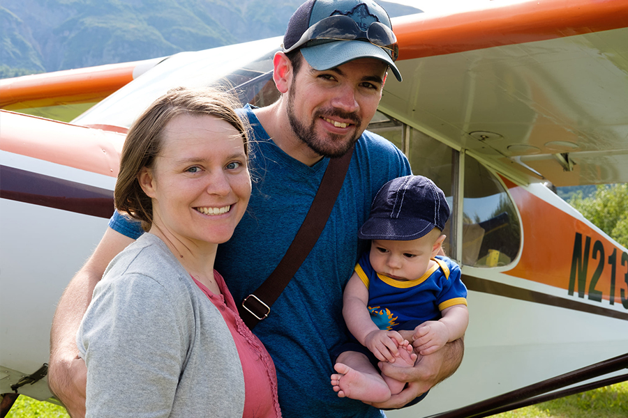 Derrick and his Family next to a Supercub